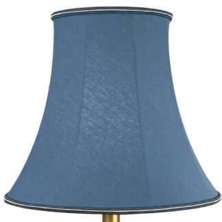 Illuminated blue brushed cotton bowed empire lampshade with soft textured finish