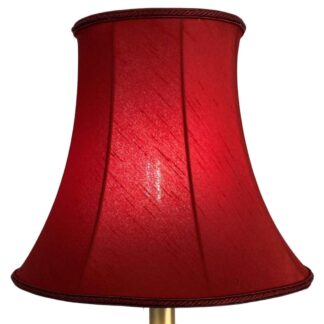 Illuminated burgundy faux silk bowed empire lampshade with subtle dupion texture