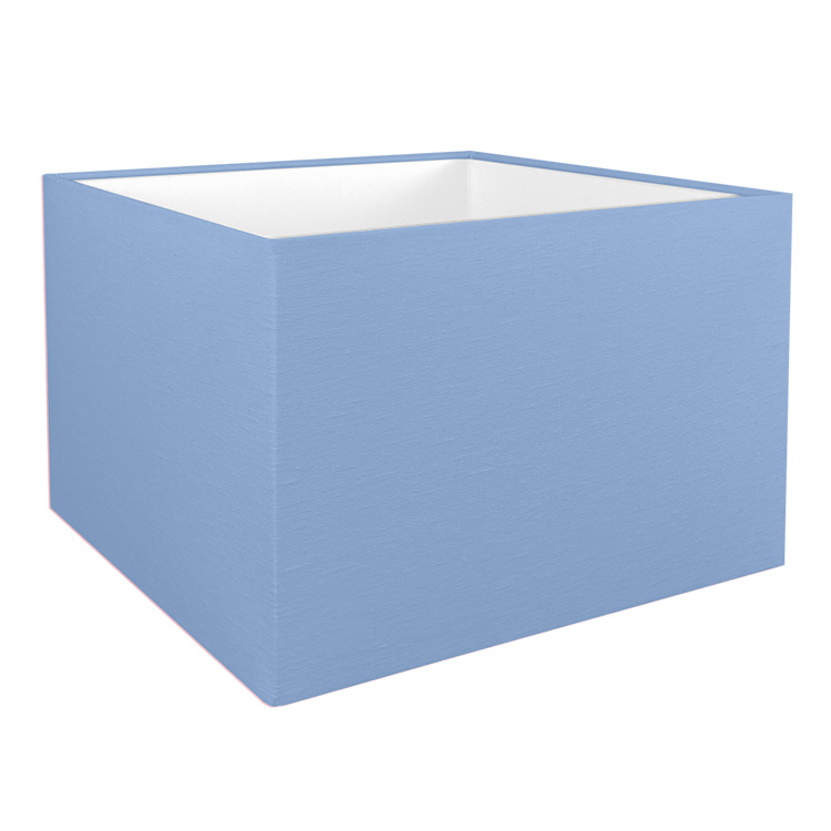 The square lampshade in blue shown with the standard white PVC lining option