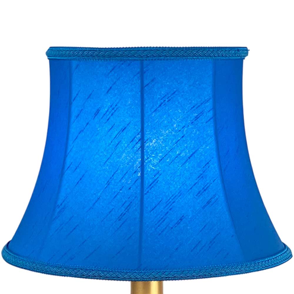 Bowed drum made in blue faux silk and finished with a matching plait trim