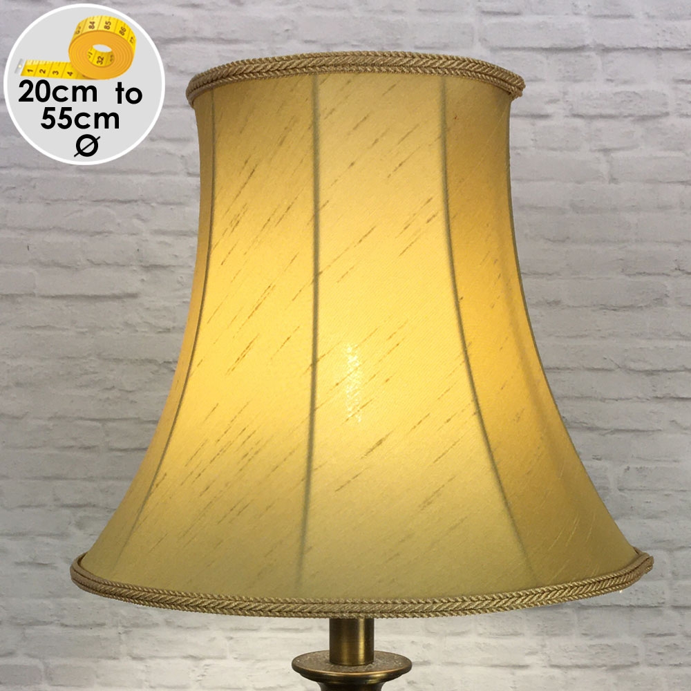 A Traditional Bell shaped lampshade in Old Gold coloured Faux Silk with a matching Old Gold Rope Trim. Suitable for all Table, Floor and Standard Lamps.