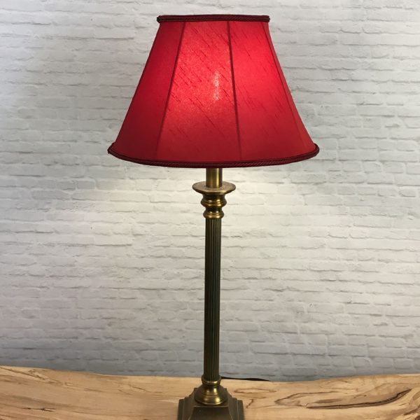 A Traditional table lamp showing our straight sided Empire lampshade in Burgundy faux silk with a matching Burgundy Rope Braid. Shown switched on. Suitable for all table, floor and standard lampshades