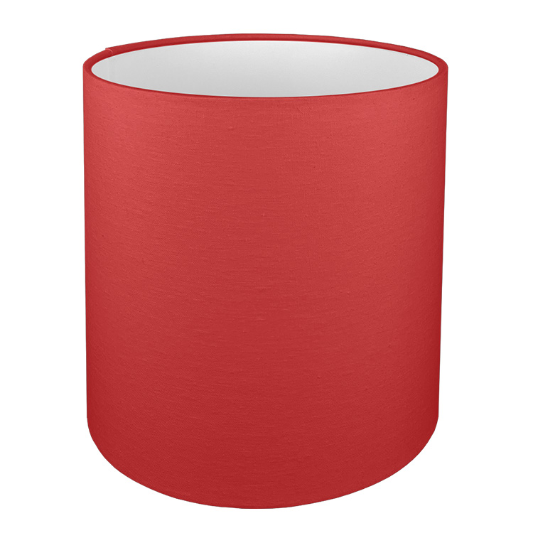 A tall drum lampshade in red brushed cotton with a white PVC inner lining