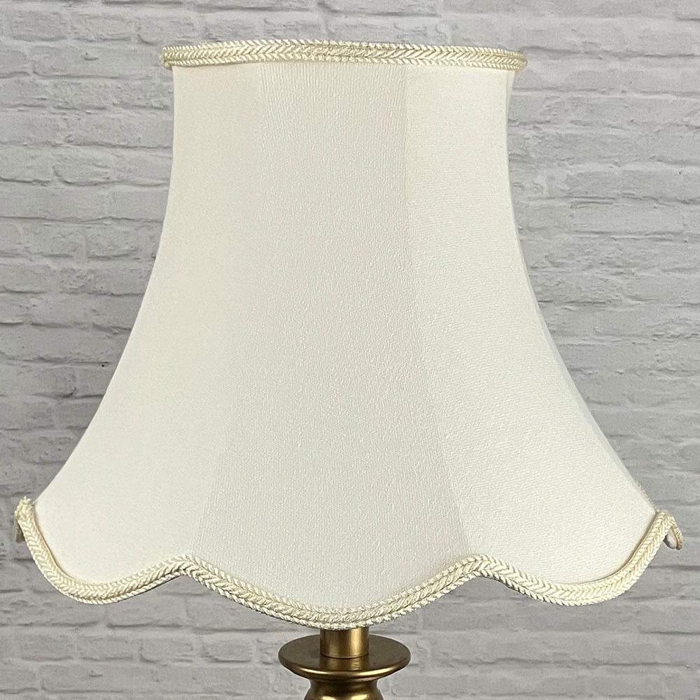 Cream Scalloped Light shade switched off on a Floor lamp