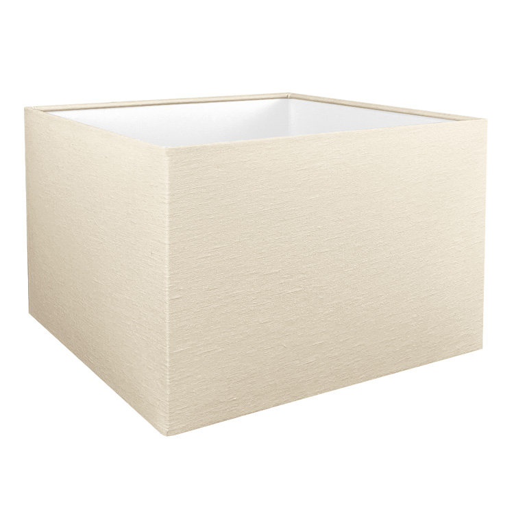 The square lampshade in cream shown with the standard white PVC lining option