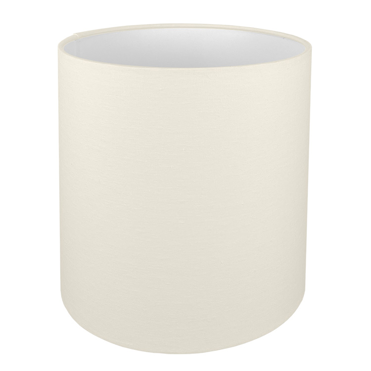 A tall drum lampshade in cream brushed cotton with a white PVC inner lining