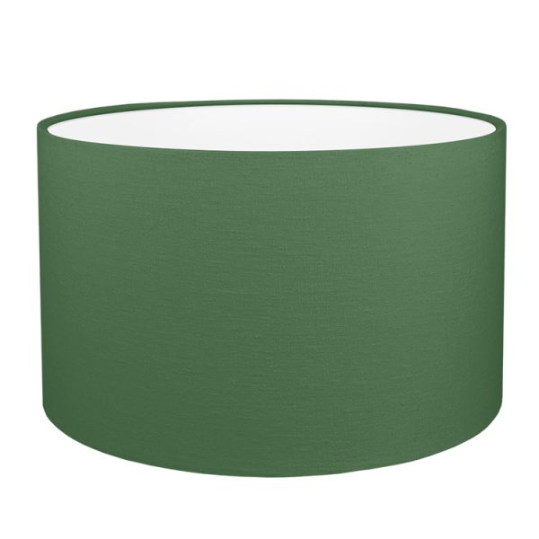 A dark green drum lampshade with white PVC lining