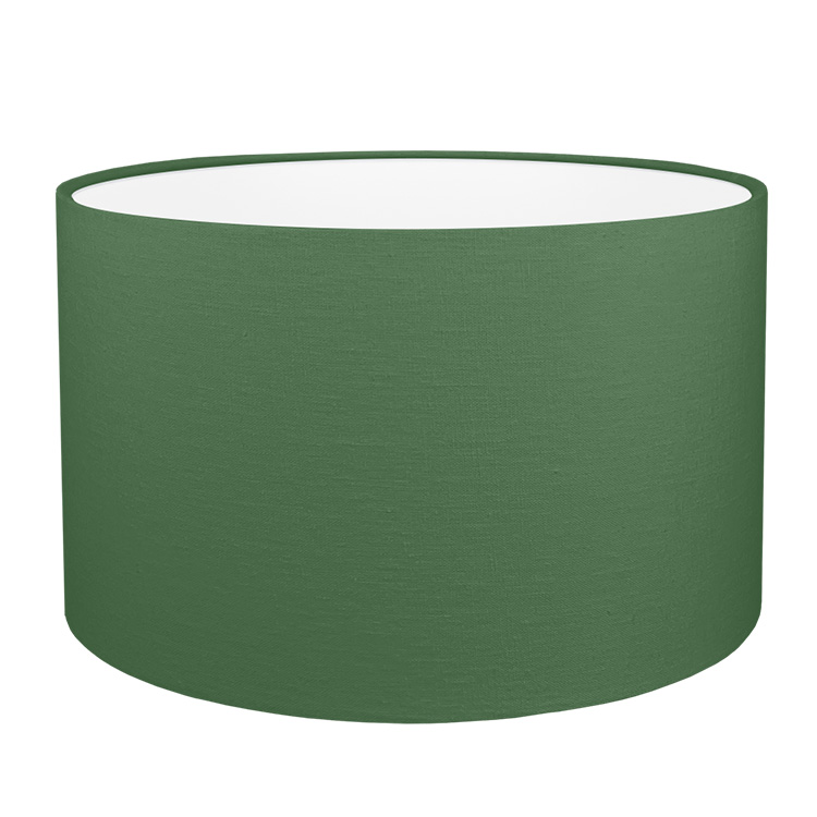 A dark green drum lampshade with white PVC lining