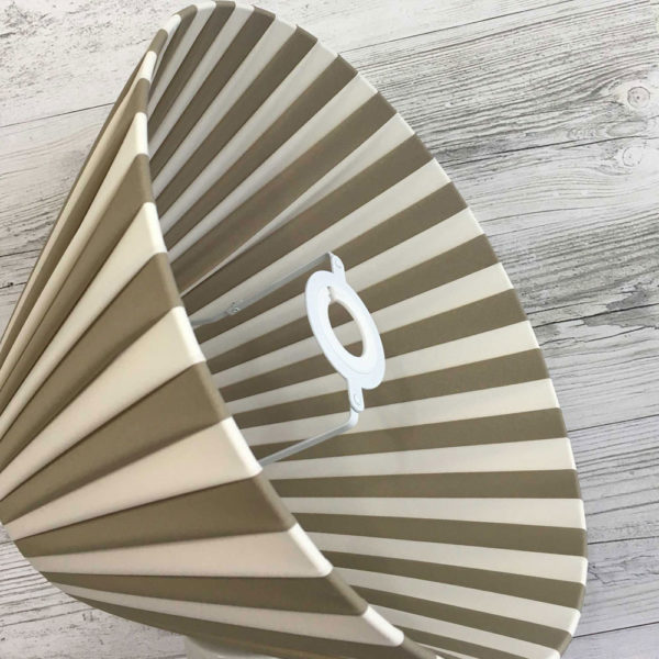 Pleated Lightshade shown on its side in khaki and cream stripe