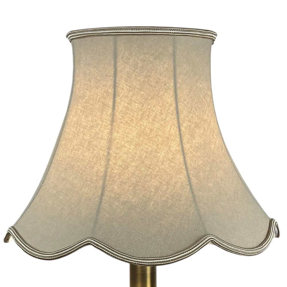 Fawn Scalloped Light shade on a Table lamp lit up