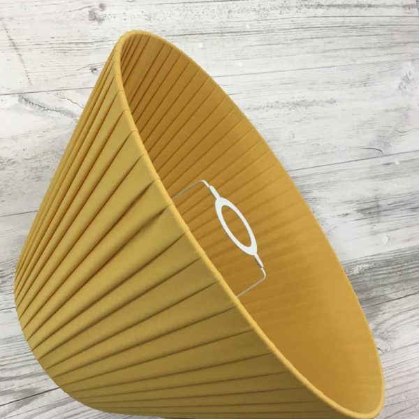 Gold Pleated Lightshade shown on its side