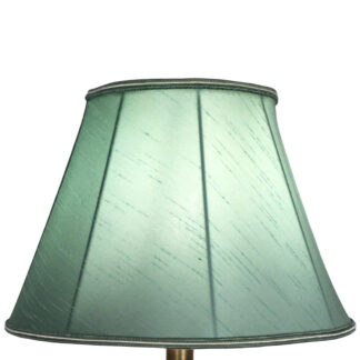 Illuminated green faux silk empire lampshade with green and oyster soutache trim