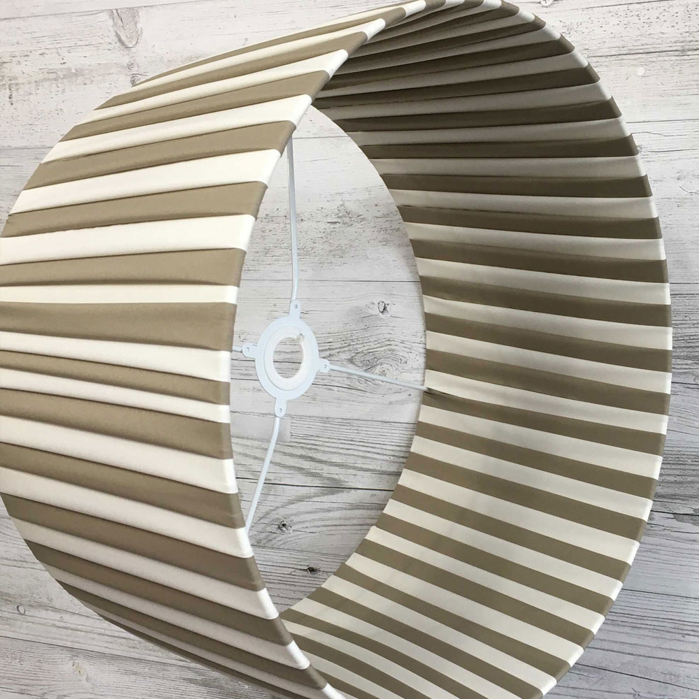 Pleated Lightshade shown on its side in khaki and cream stripe