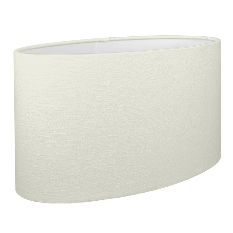 A Off White oval lampshade shown with the standard white PVC lining