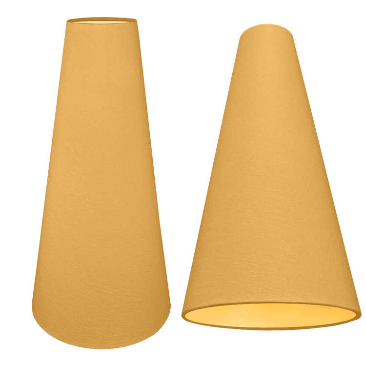 A tall cone lampshade in old gold brushed cotton with a metallic gold inner lining