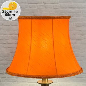 Vibrant Retro Orange Faux silk Lampshade with Matching Plaited Rope, shown as a Table Lamp Lit Up