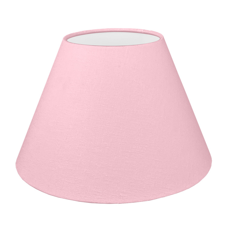 Our pink empire lampshade shown with a standard white PVC lining