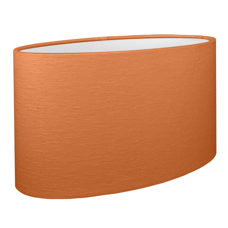 A orange oval lampshade shown with the standard white PVC lining