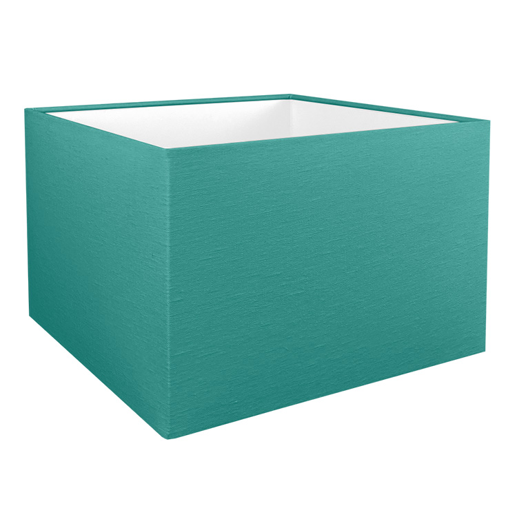 The teal square lampshade shown with the standard white PVC lining option