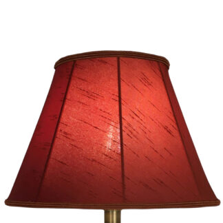 Illuminated terracotta faux silk empire lampshade with terracotta soutache trim