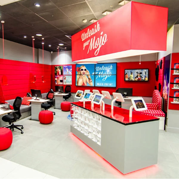 VIrgin-Travel A large red rectangular commercial lampshade in a Virgin Holiday store