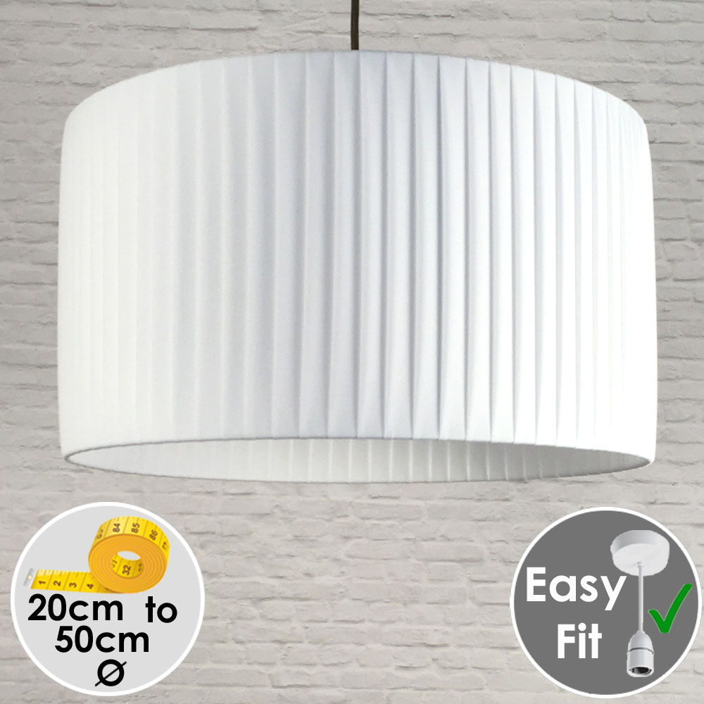 White pleated drum lampshade shown as a pendant