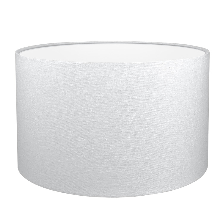 A white drum lampshade shown with white lining