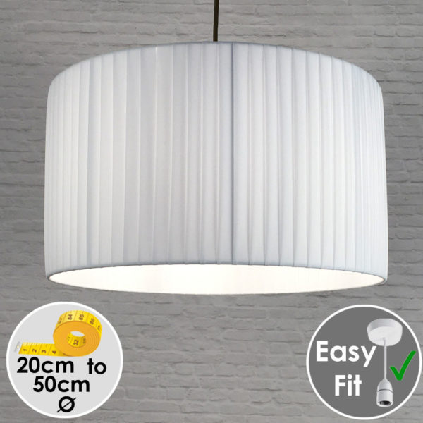 White pleated drum pendant light shade switched on