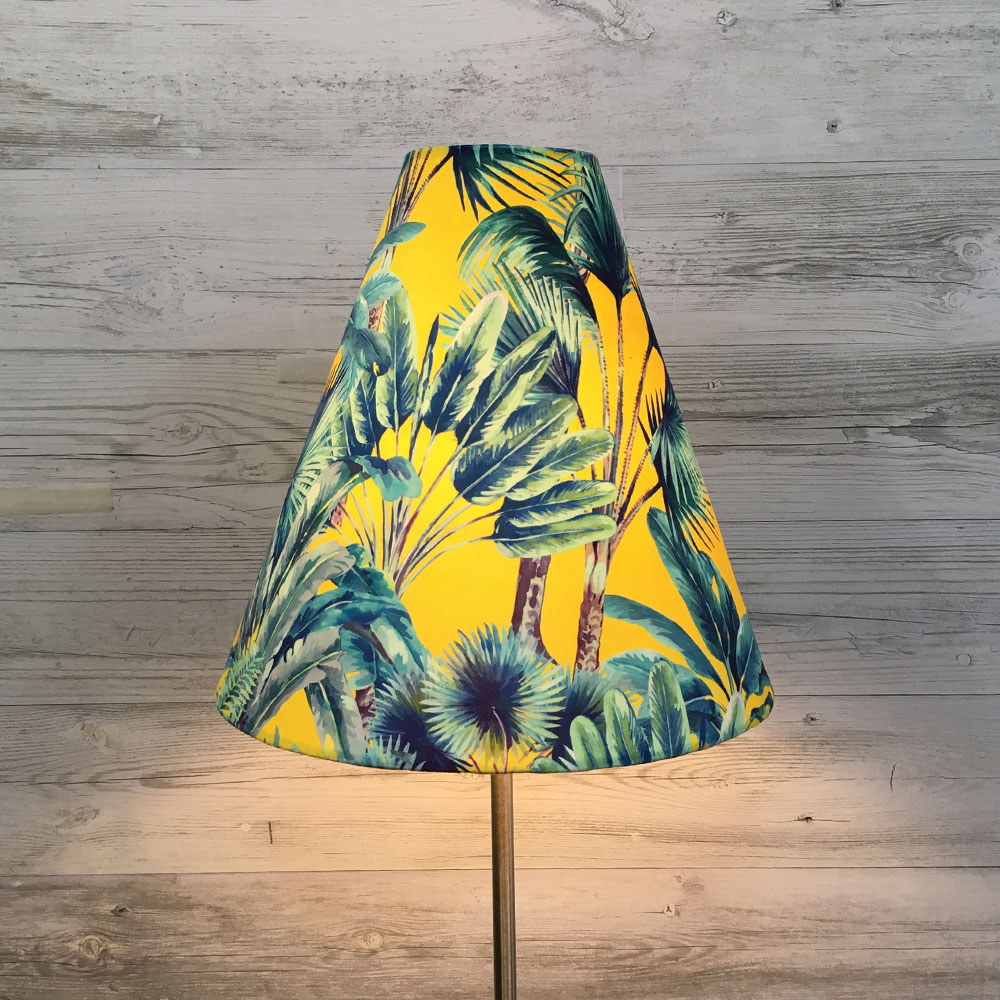 Yellow tropical palm cone lampshade on table lamp