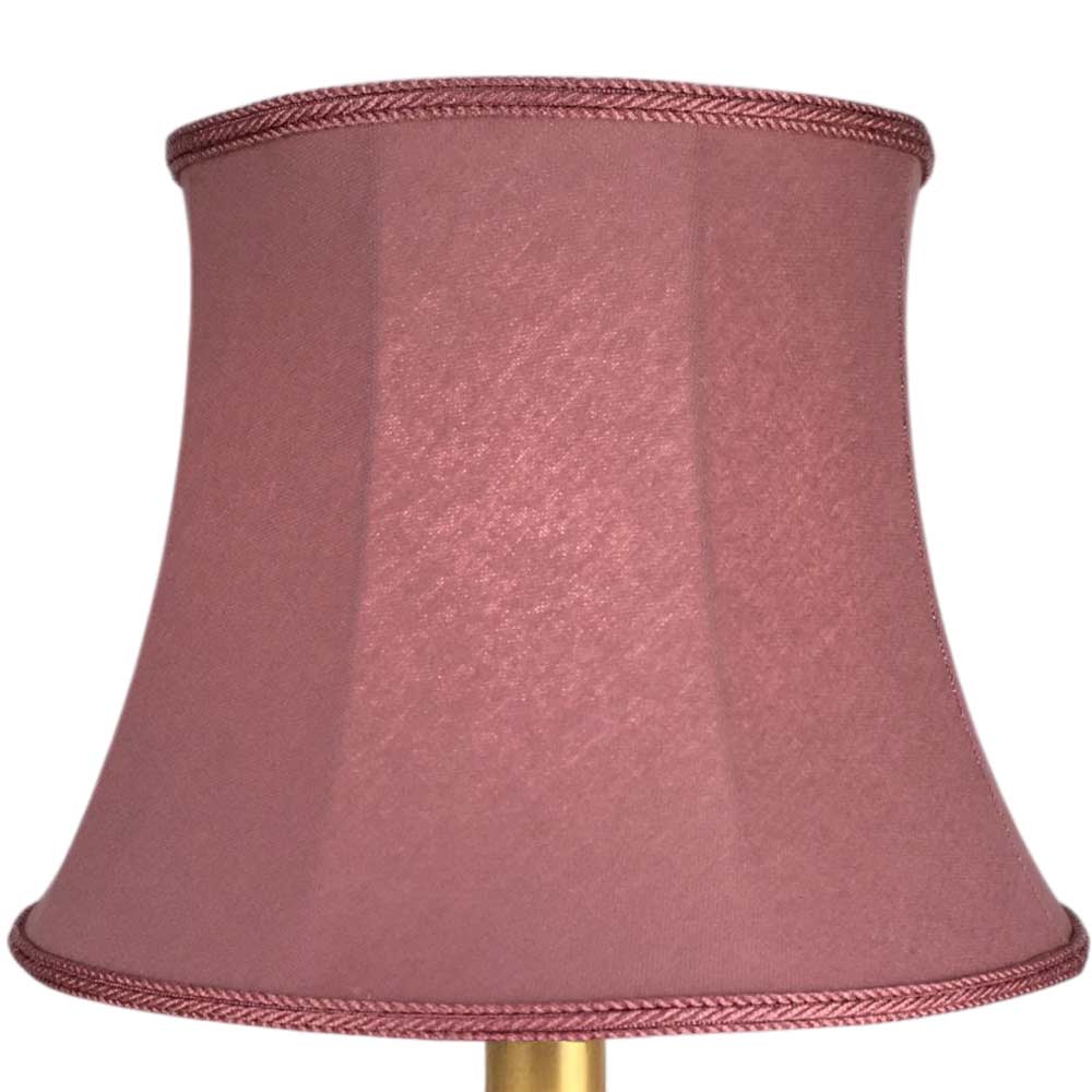 Illuminated Bon Bon pink brushed cotton bowed drum lampshade with elegant curved silhouette