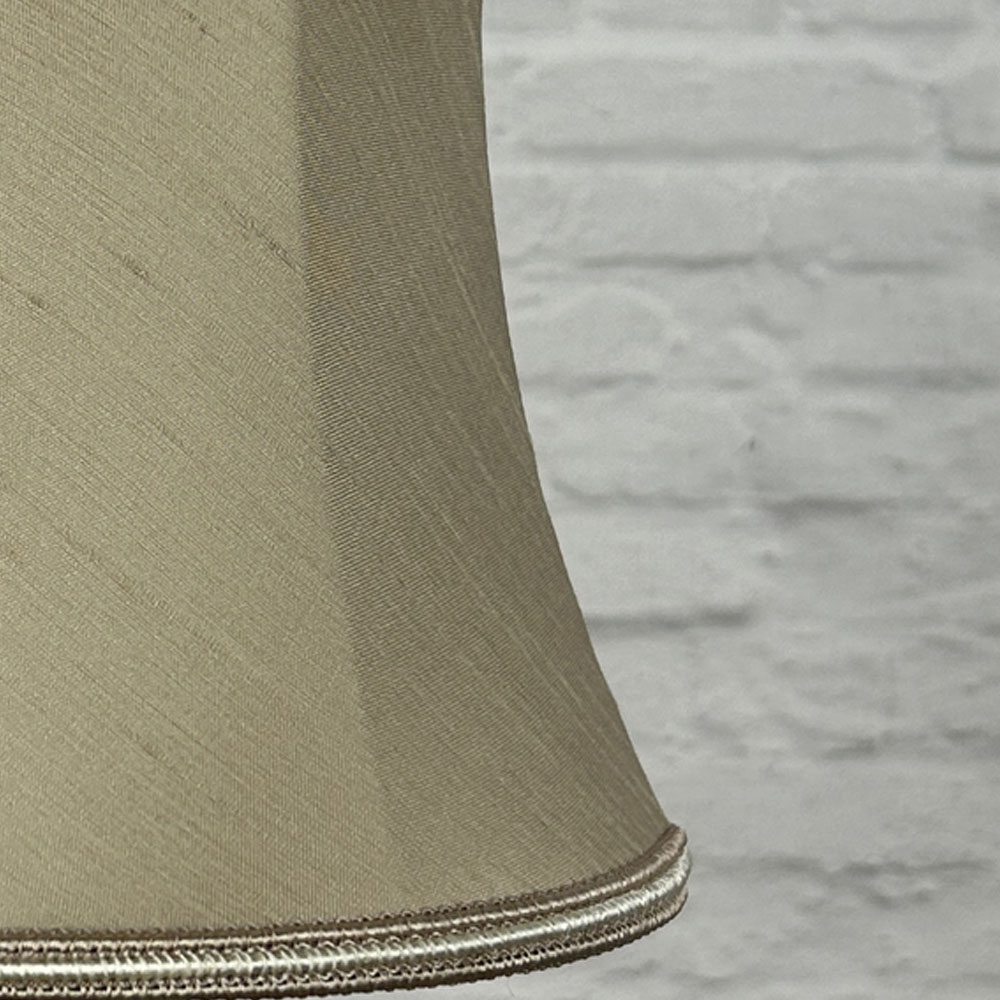 Close-up of fawn faux silk bowed chandelier shade