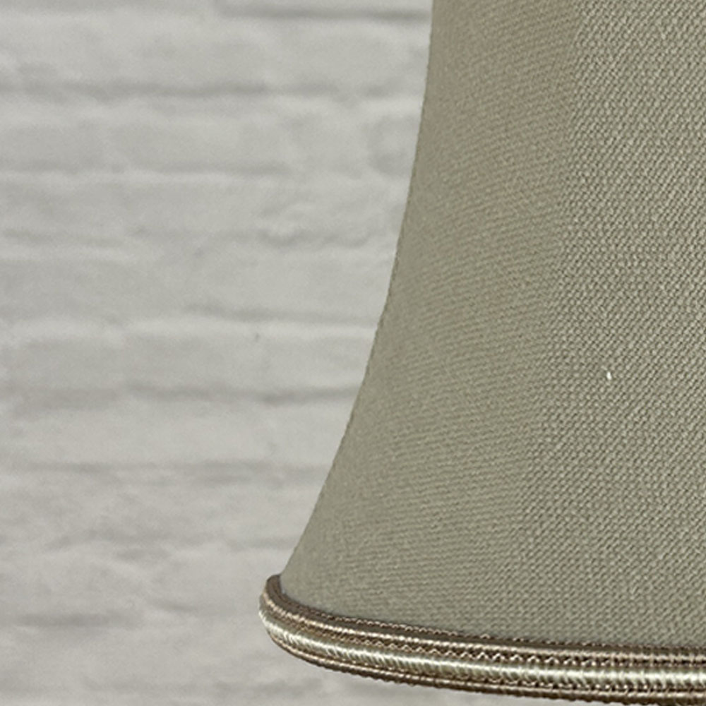 Close-up of fawn brushed cotton bowed chandelier shade with oyster soutache trim
