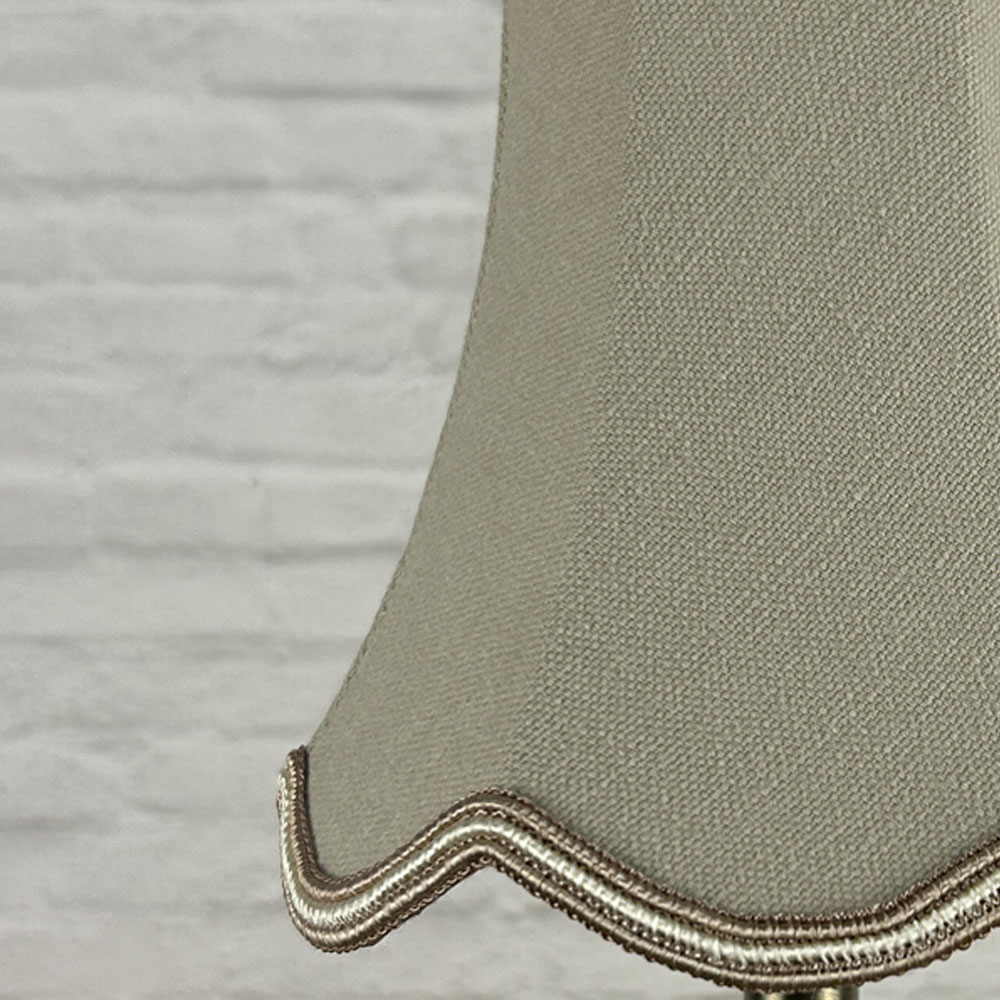 Close-up of fawn brushed cotton scalloped chandelier shade with oyster soutache trim