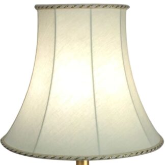 cream and gold bowed empire shade on a white background