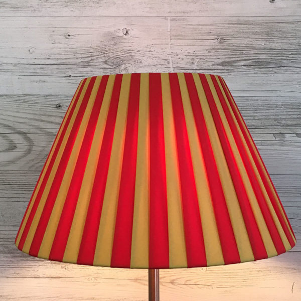 Knife Pleat Lampshade in Red and Gold Stripe for Table Lamp. Switched On