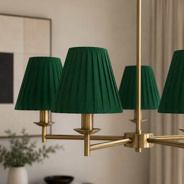 Handmade Green Pleated Chandelier Lampshade | Imperial Lighting Handmade green pleated chandelier lampshades, fitted to a chandelier in an elegant interior.
