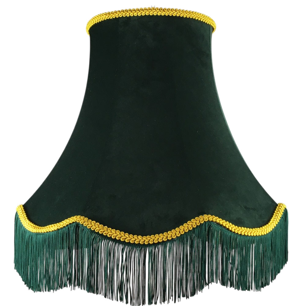 Illuminated dark green velvet scalloped bowed empire lampshade with yellow feather trim, green fringe and gold lining