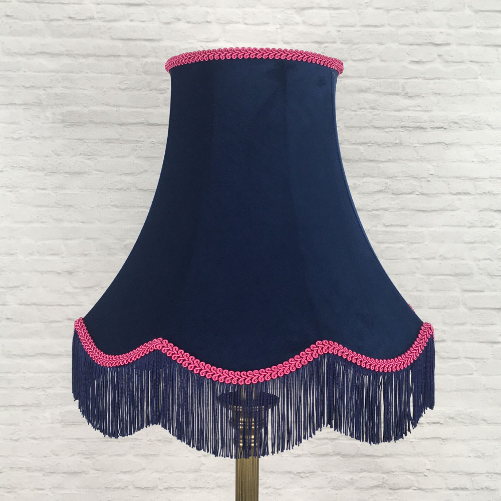 Navy velvet scalloped bowed empire lampshade with hot pink feather trim on floor lamp