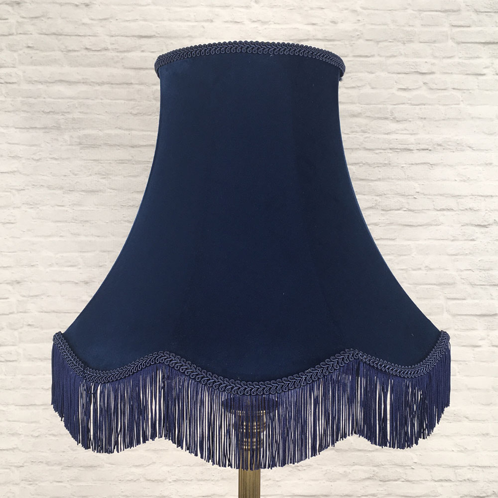 Navy velvet scalloped bowed empire lampshade with navy feather trim on floor lamp