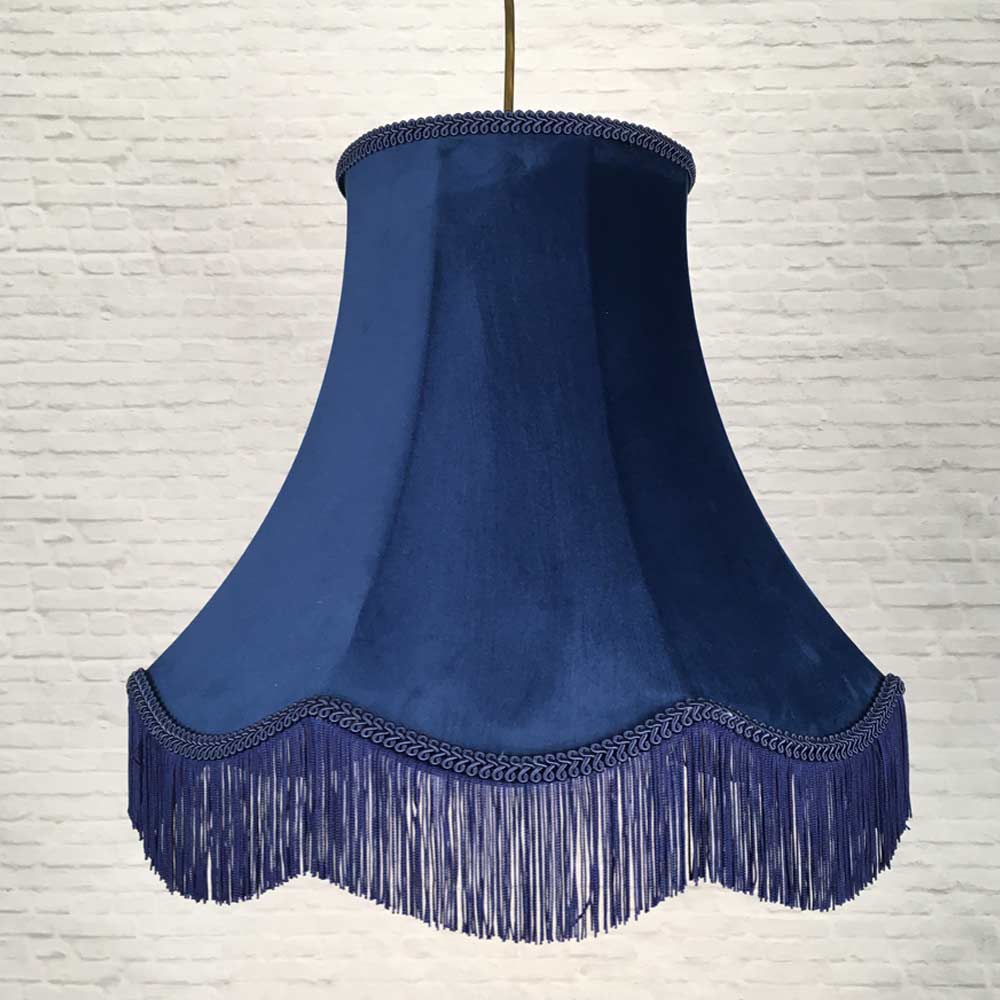 Navy velvet scalloped bowed empire lampshade with navy feather trim on floor lamp