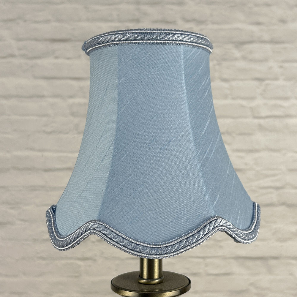 Pale blue faux silk scalloped chandelier shade with rope trim unlit