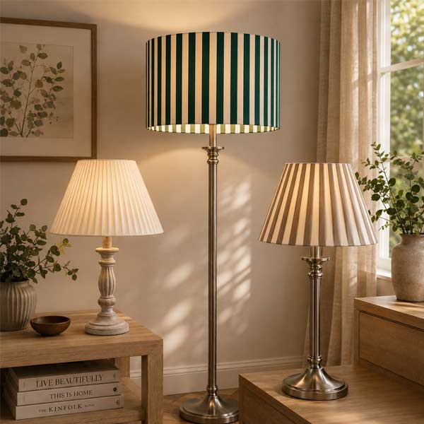 Pleated lampshades on table and floor lamps