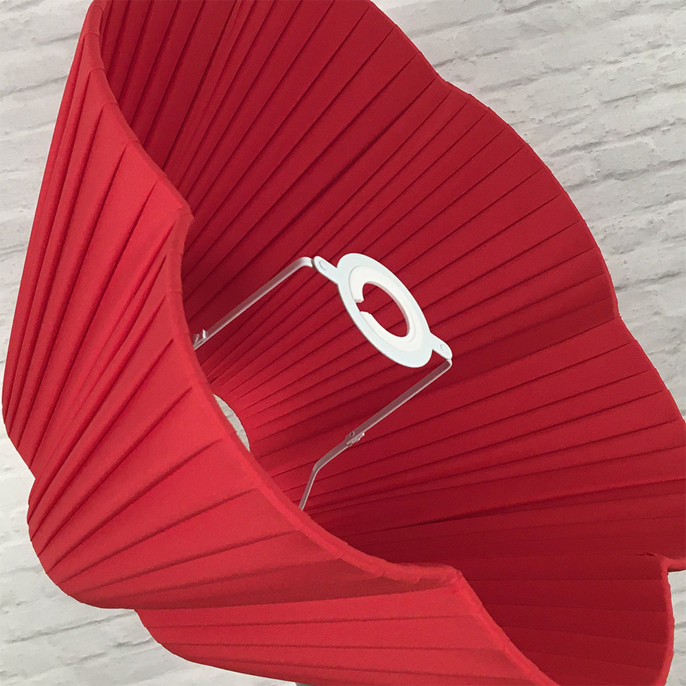 Interior view of red daisy scallop pleated lampshade fitting