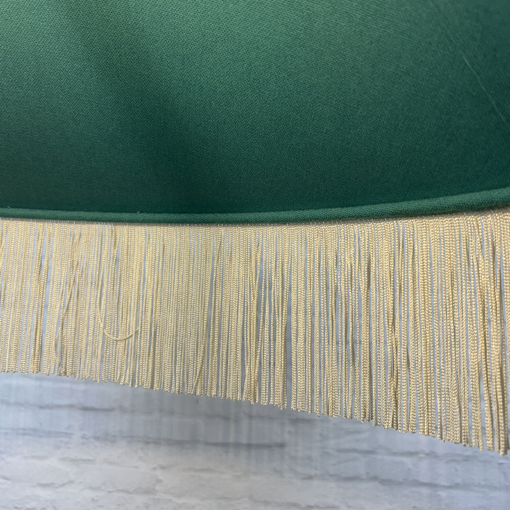 Interior lining and dark cream fringe detail of the Teal & Oyster fringe lampshade.